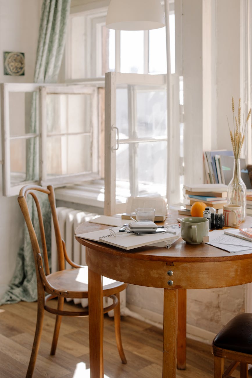 brown wooden table with chairs